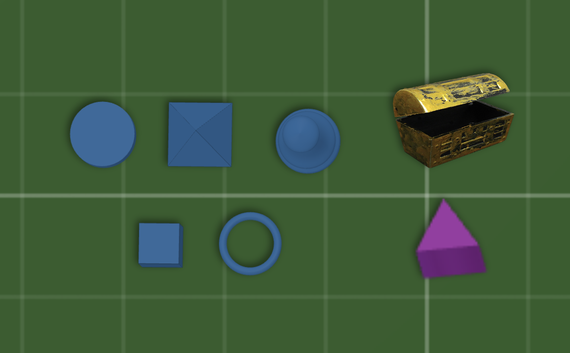 The seven token kinds on a table: five built-in blue tokens (disc, pyramid, pawn, block, ring) on the left, a treasure chest Image Token at top right, and a purple model token at bottom right